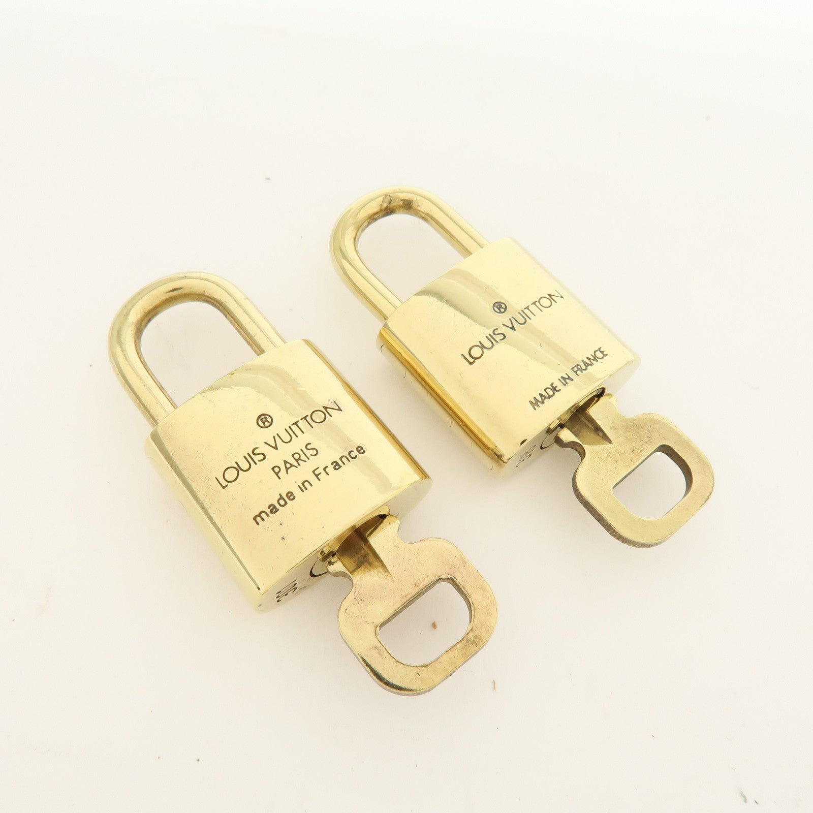 Louis Vuitton Lot of 10 Metal Lock & Key Cadena Key Lock Gold