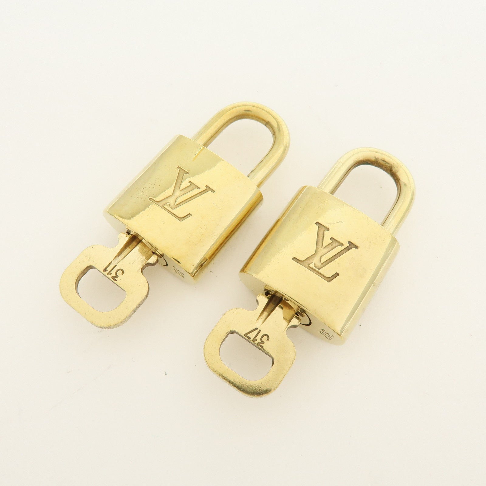 Louis Vuitton Lot of 10 Metal Lock & Key Cadena Key Lock Gold