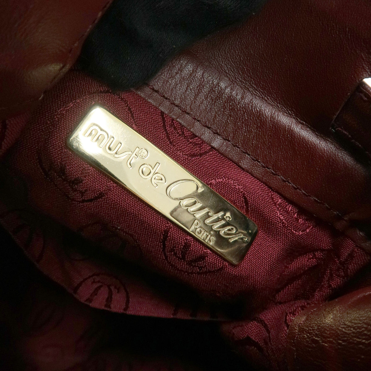 Cartier Must de Cartier Leather Drawstring Mini Shoulder Bag Bordeaux