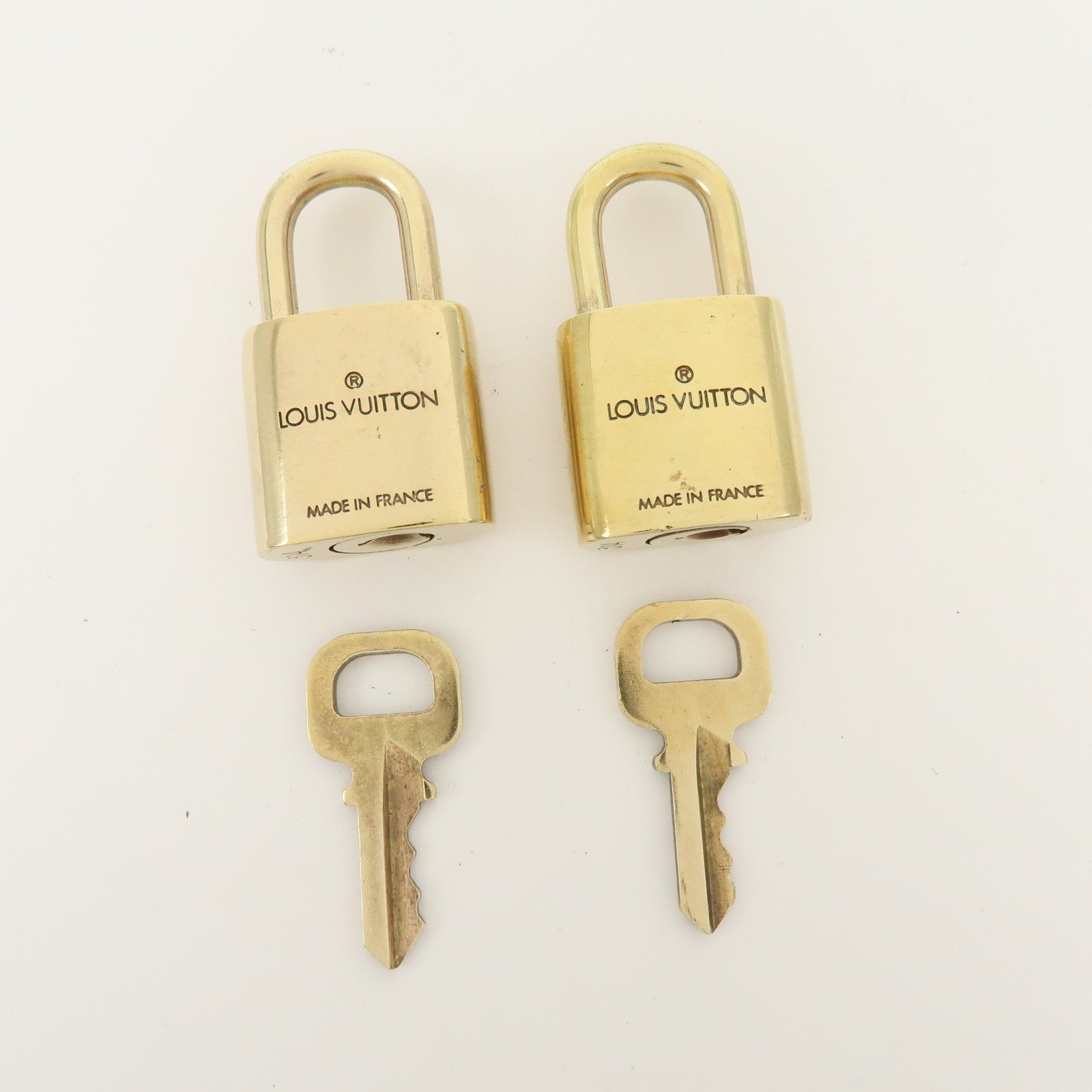 Louis Vuitton Set of 10 Metal Lock & Key Cadena Key Lock Gold