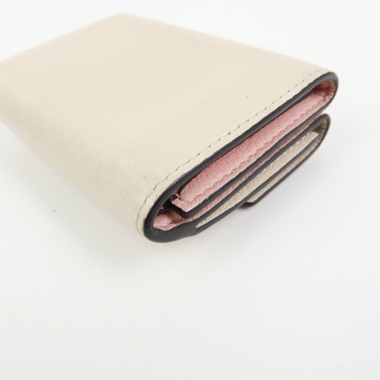 Louis Vuitton Portefeuille Lockmini Taurillon Compact Wallet M80785