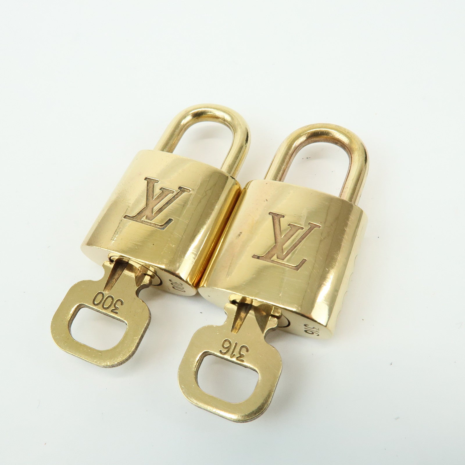 Louis Vuitton Set of 10 Lock & Key Cadena Key Lock