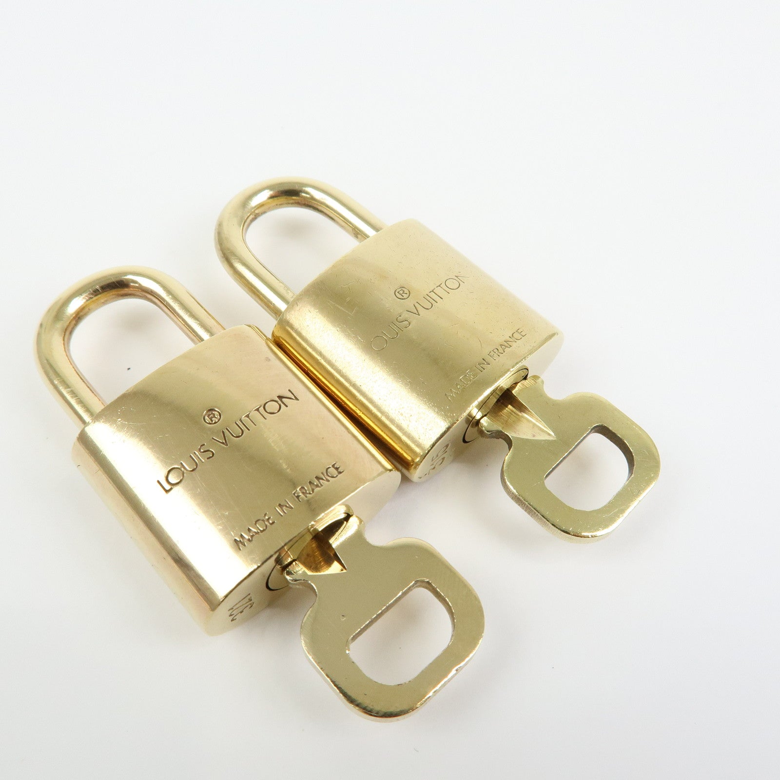 Louis Vuitton Set of 10 Lock & Key Cadena Key Lock Gold