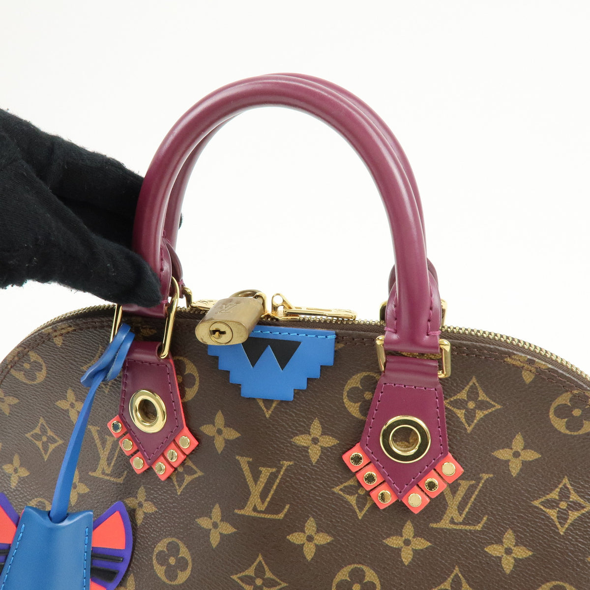 Louis Vuitton Monogram Totem Alma PM Hand Bag Brown Magenta M41662