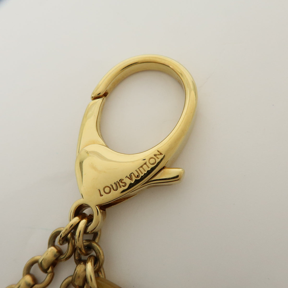 Louis Vuitton Bijou Sac Insolence Bag Charm Gold Brown M65844