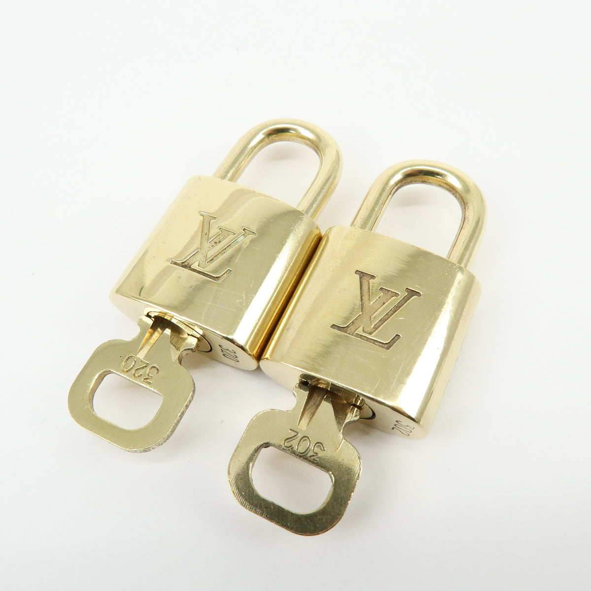 Louis Vuitton Lot of 10 Lock & Key Cadena Key Lock Gold