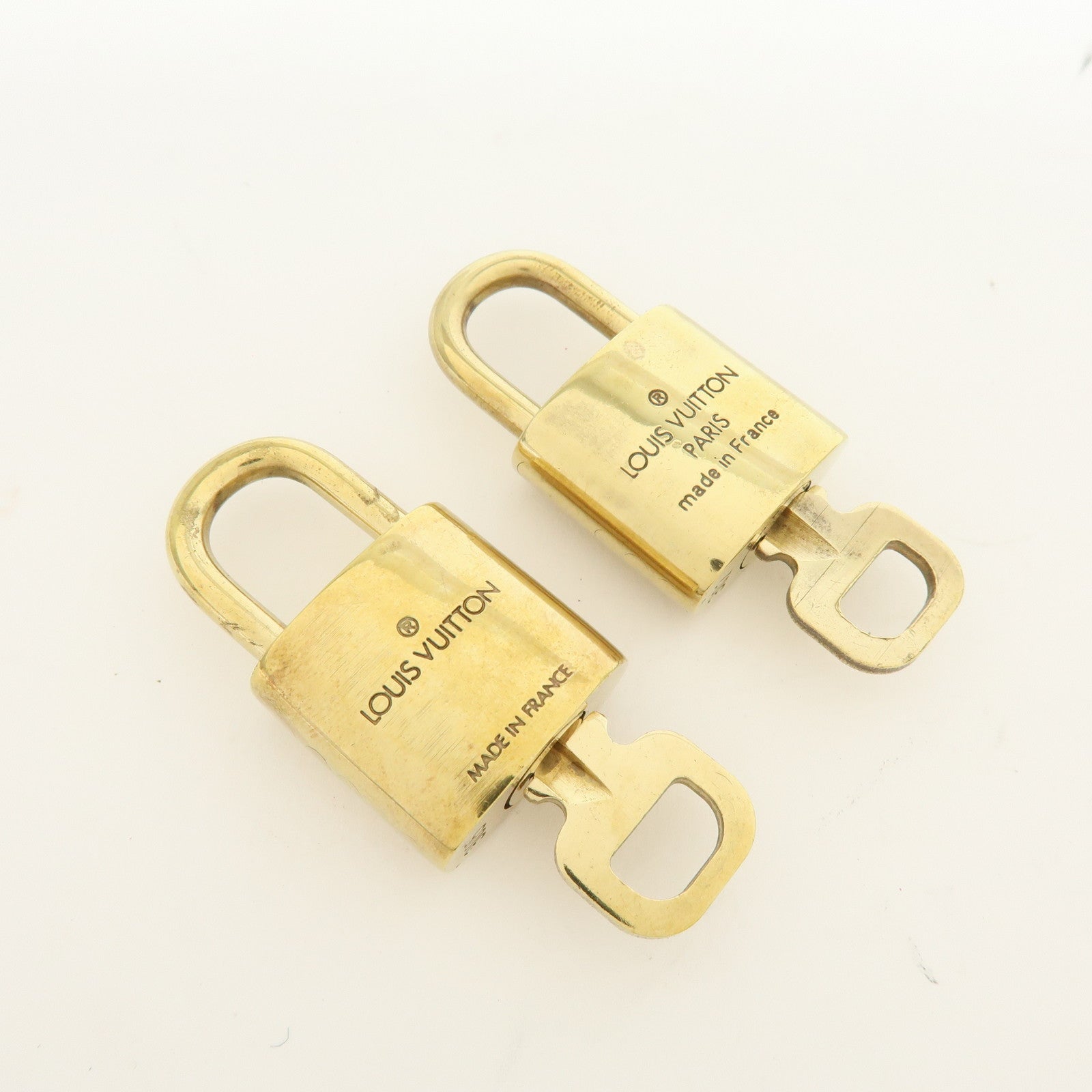 Louis Vuitton Lot of 10 Metal Lock & Key Cadena Key Lock Gold