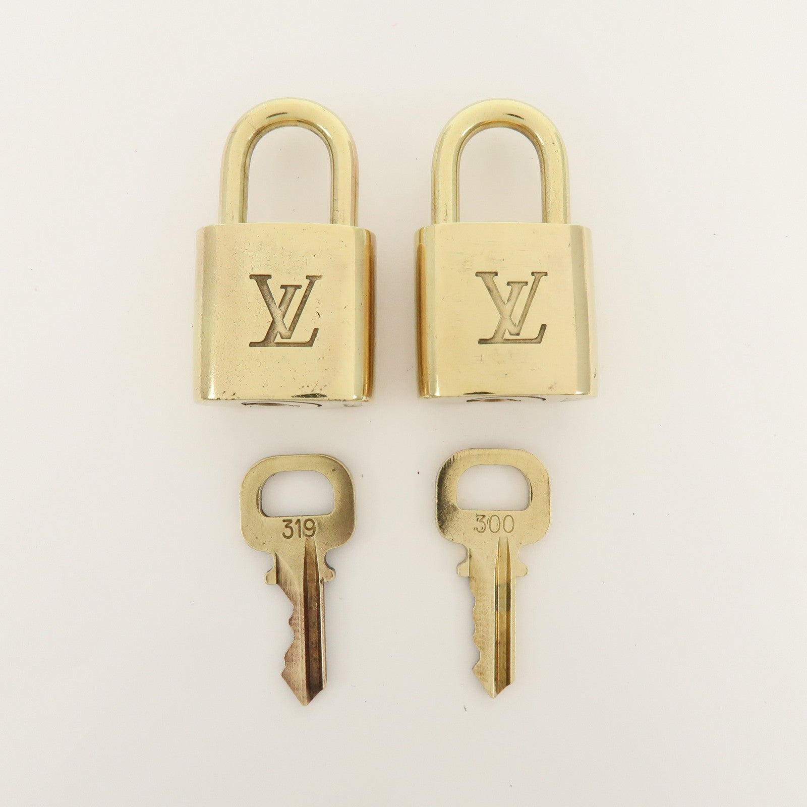 Louis Vuitton Set of 10 Metal Lock & Key Cadena Key Lock Gold