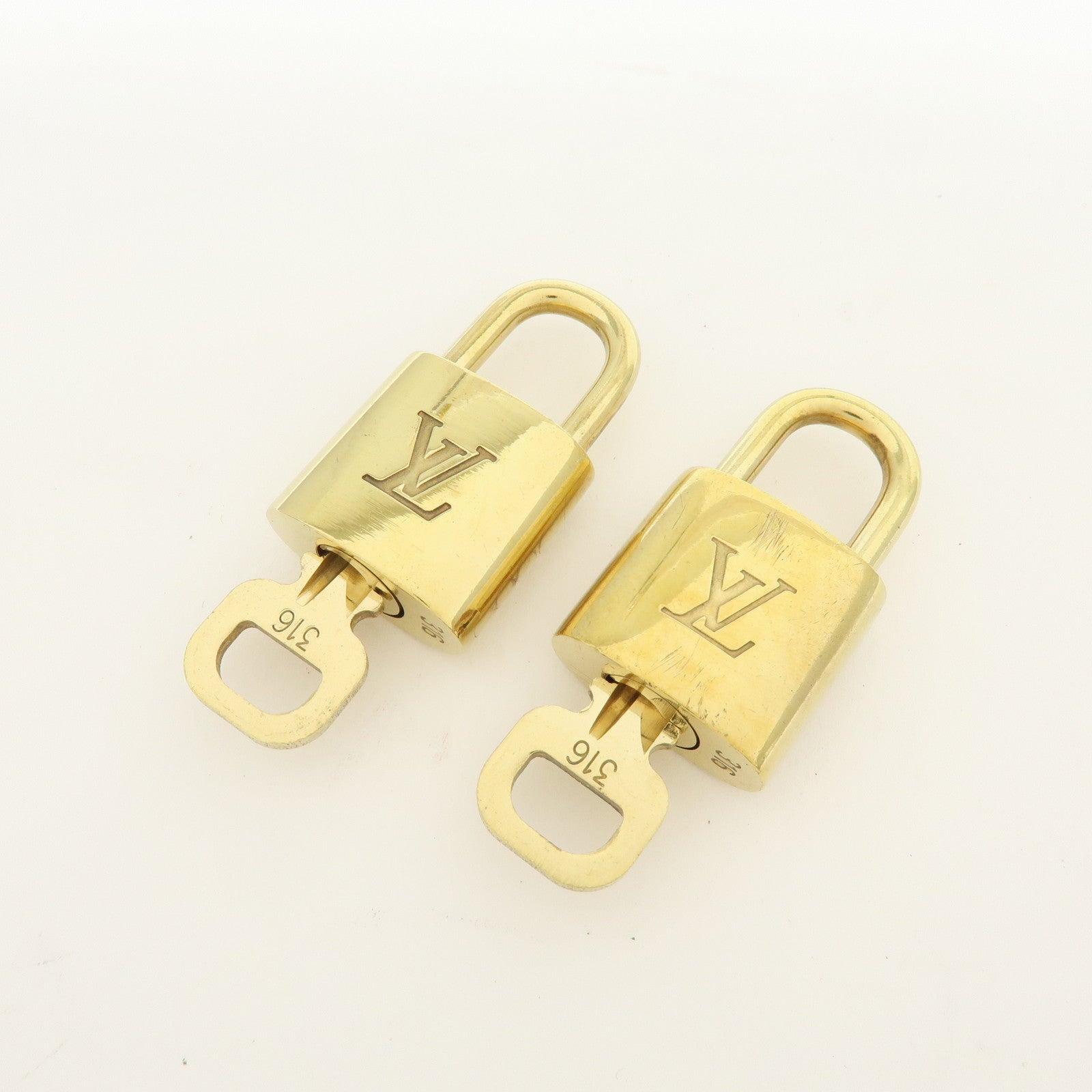 Louis Vuitton Lot of 10 Metal Lock & Key Cadena Key Lock Gold