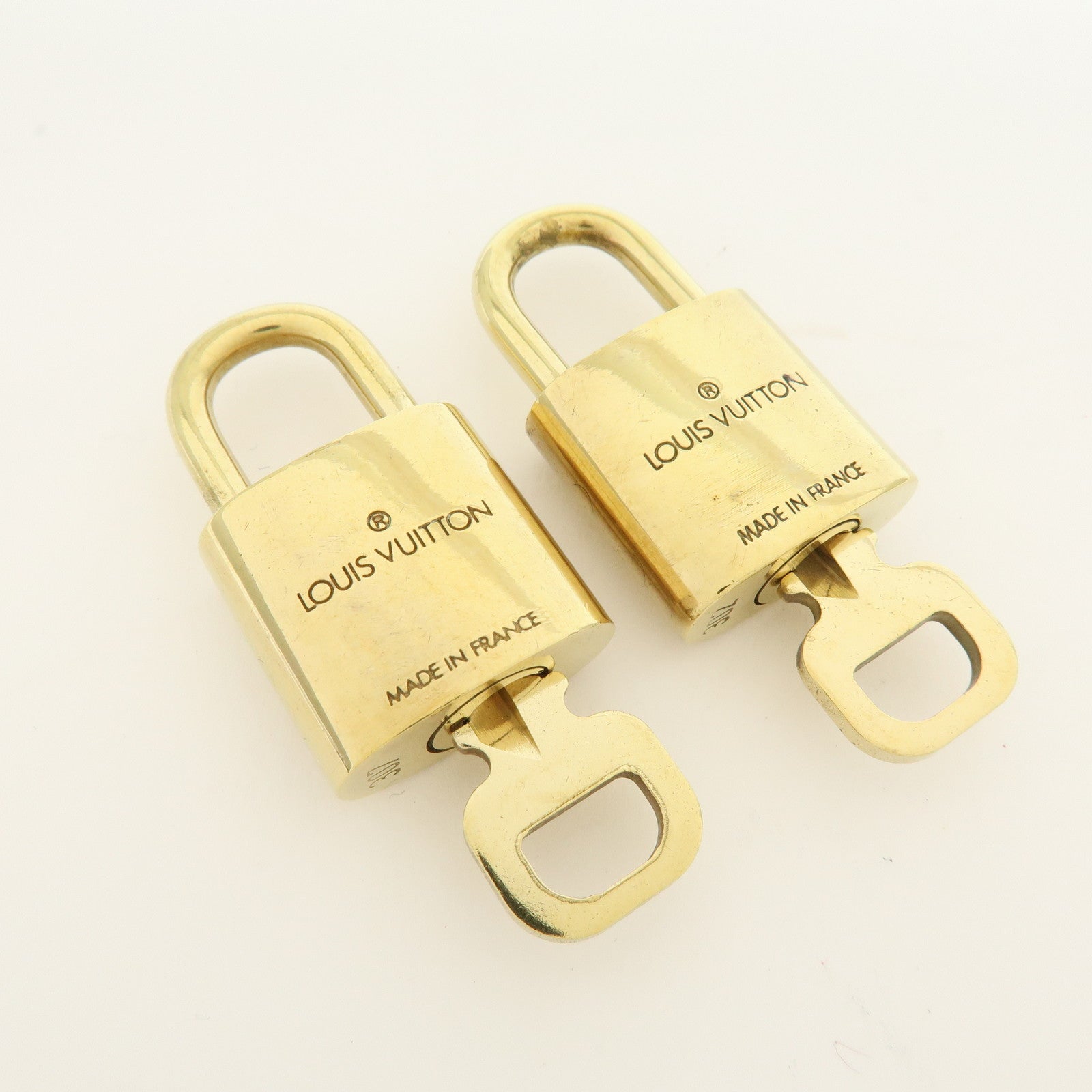 Louis Vuitton Lot of 10 Metal Lock & Key Cadena Key Lock Gold