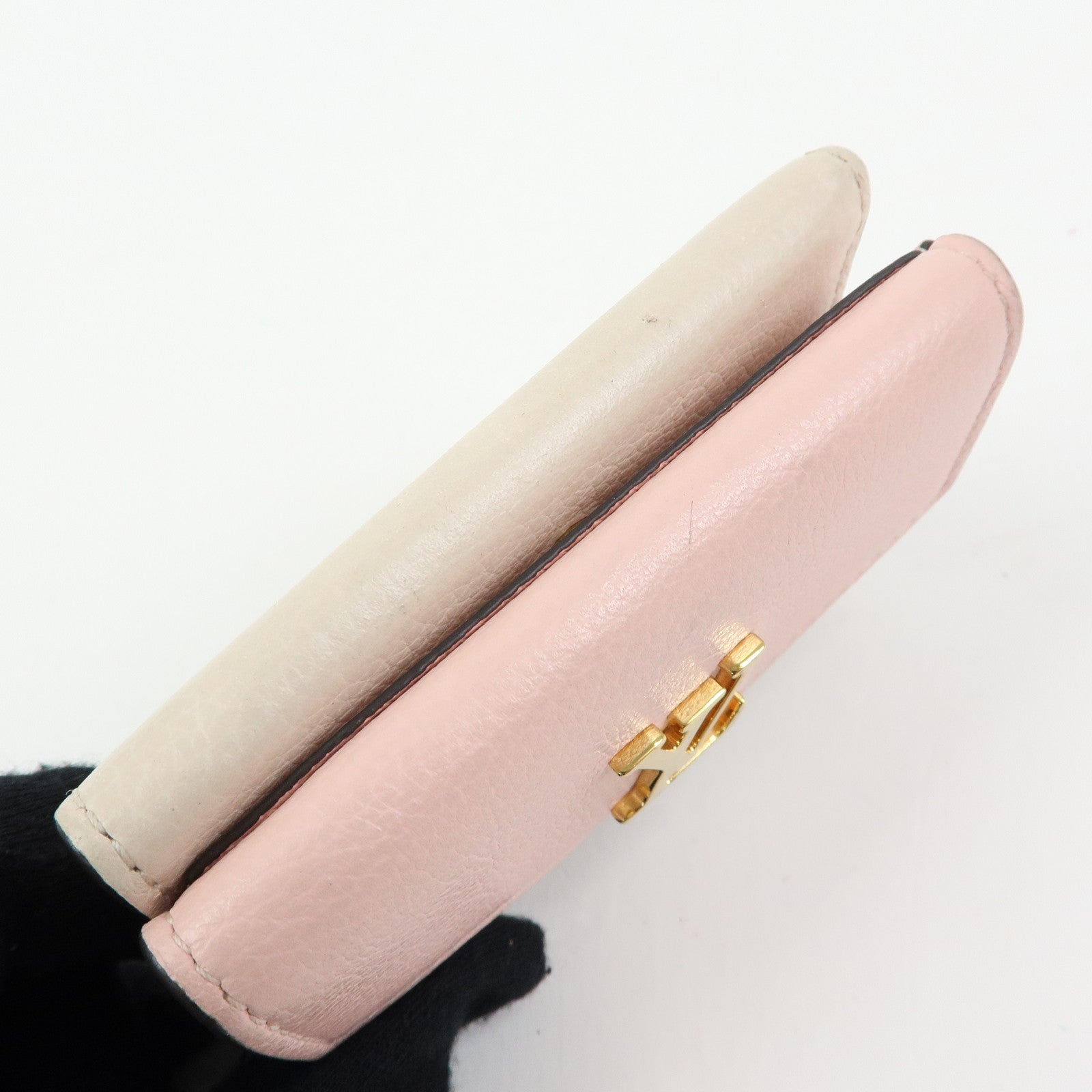 Louis Vuitton Portefeuille Lockmini Taurillon Compact Wallet M80785