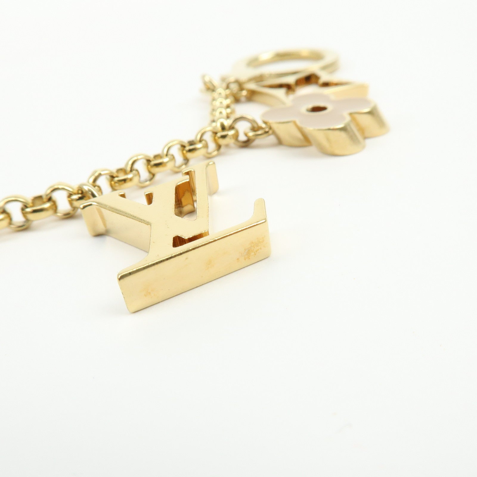 Louis Vuitton Fleur de Monogram Metal Bag Charm Key Chain Gold M65111