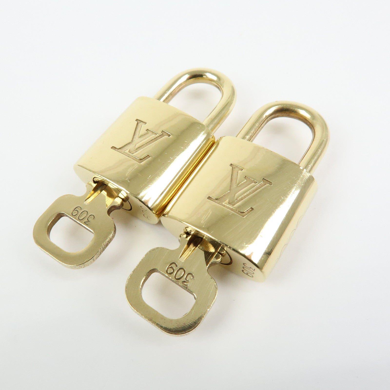 Louis Vuitton Set of 10 Lock & Key Cadena Key Lock Gold