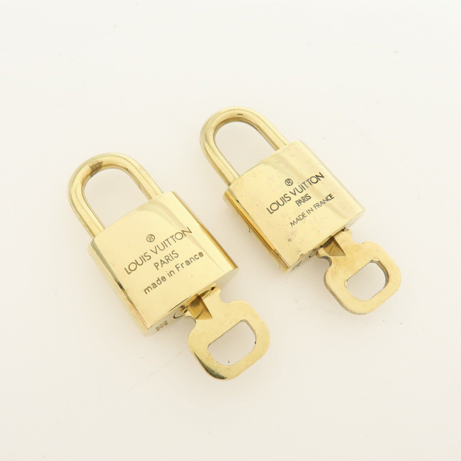 Louis Vuitton Lot of 10 Metal Lock & Key Cadena Key Lock Gold