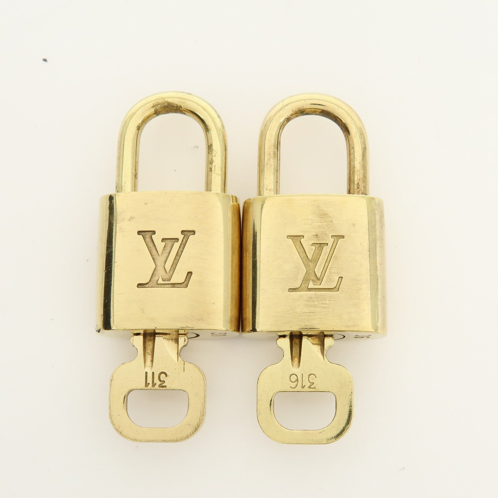 Louis Vuitton Lot of 10 Lock & Key Cadena Key Lock Gold