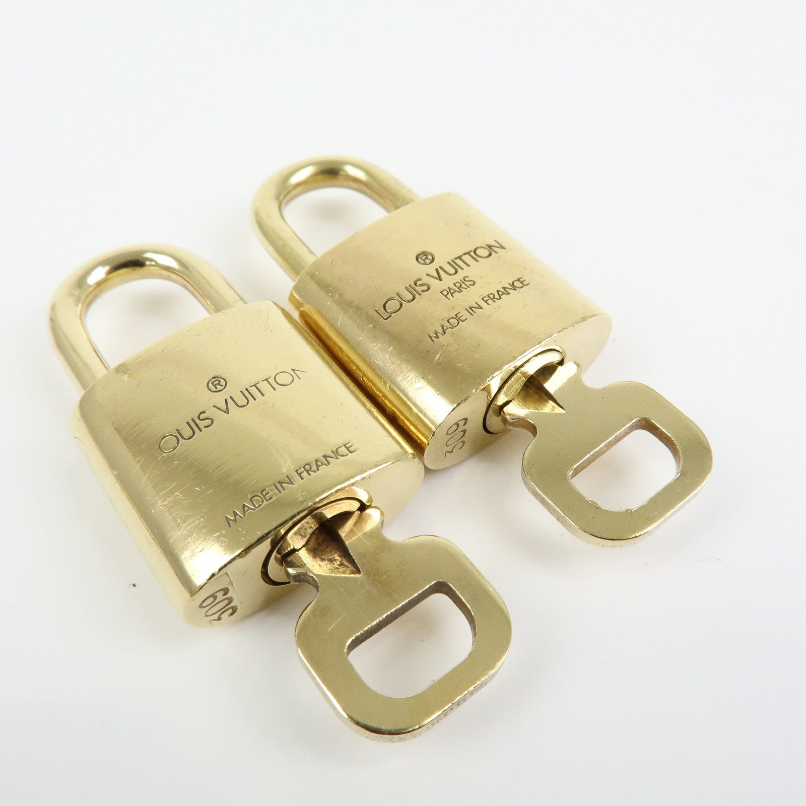 Louis Vuitton Set of 10 Lock & Key Cadena Key Lock Gold