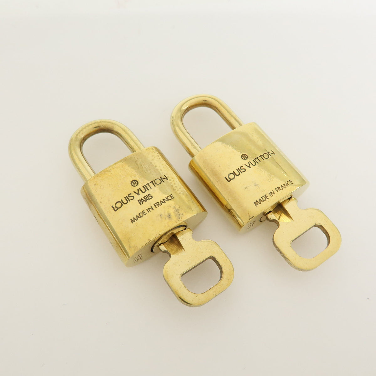 Louis Vuitton Lot of 10 Metal Lock & Key Cadena Key Lock Gold