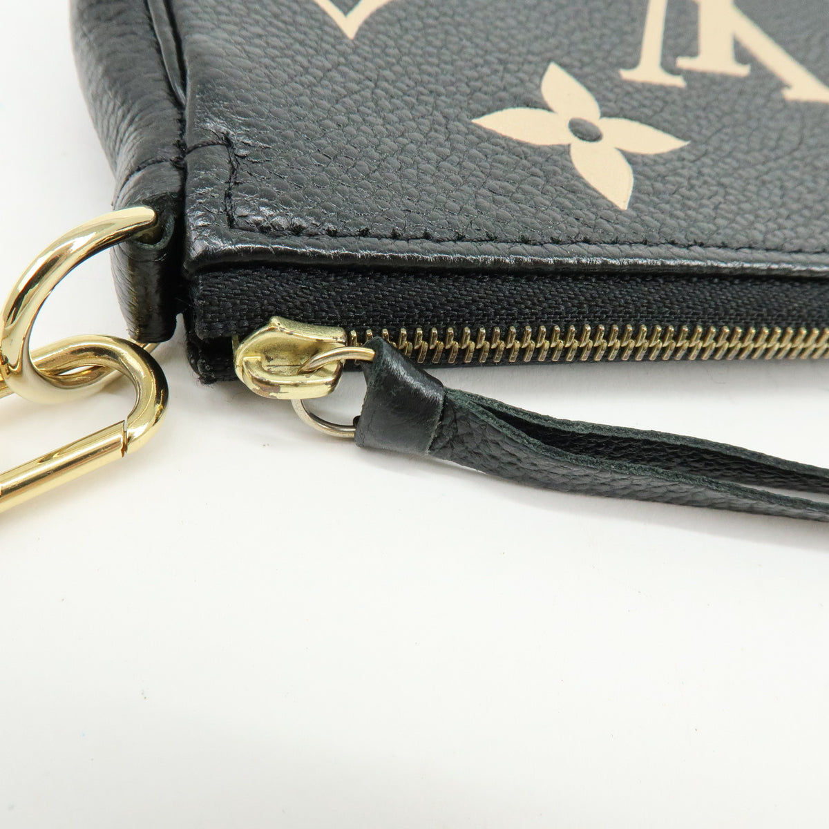 Louis Vuitton Monogram Bicolor Empreinte Mini Pochette Accessory M80732