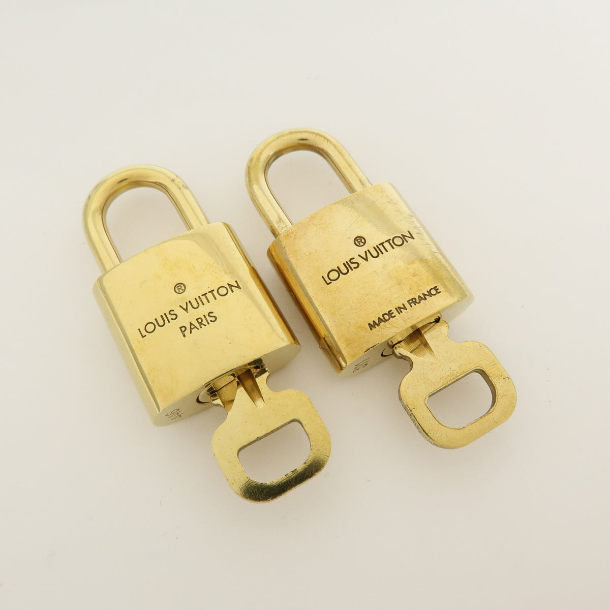Louis Vuitton Lot of 10 Metal Lock & Key Cadena Key Lock Gold