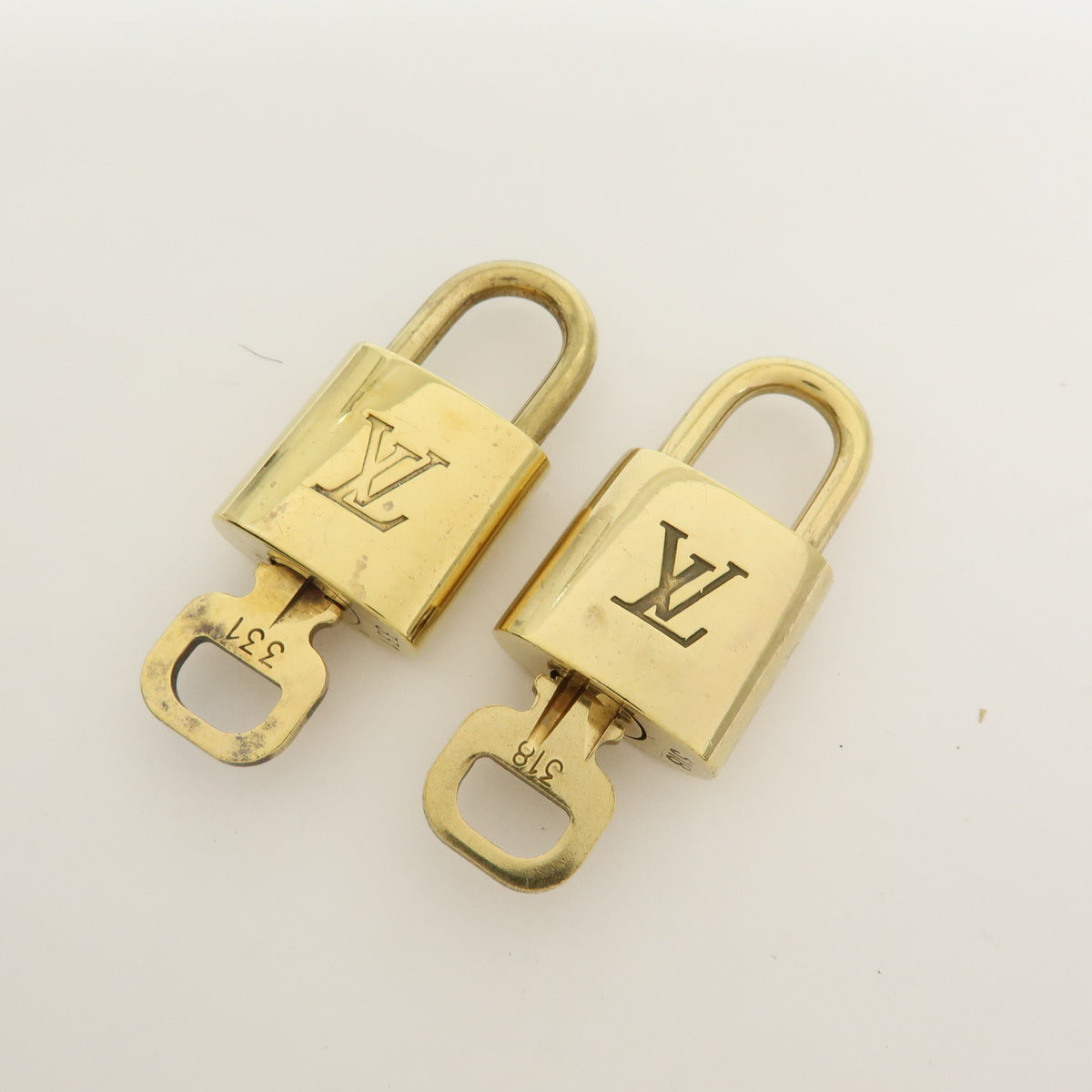Louis Vuitton Lot of 10 Metal Lock & Key Cadena Key Lock Gold