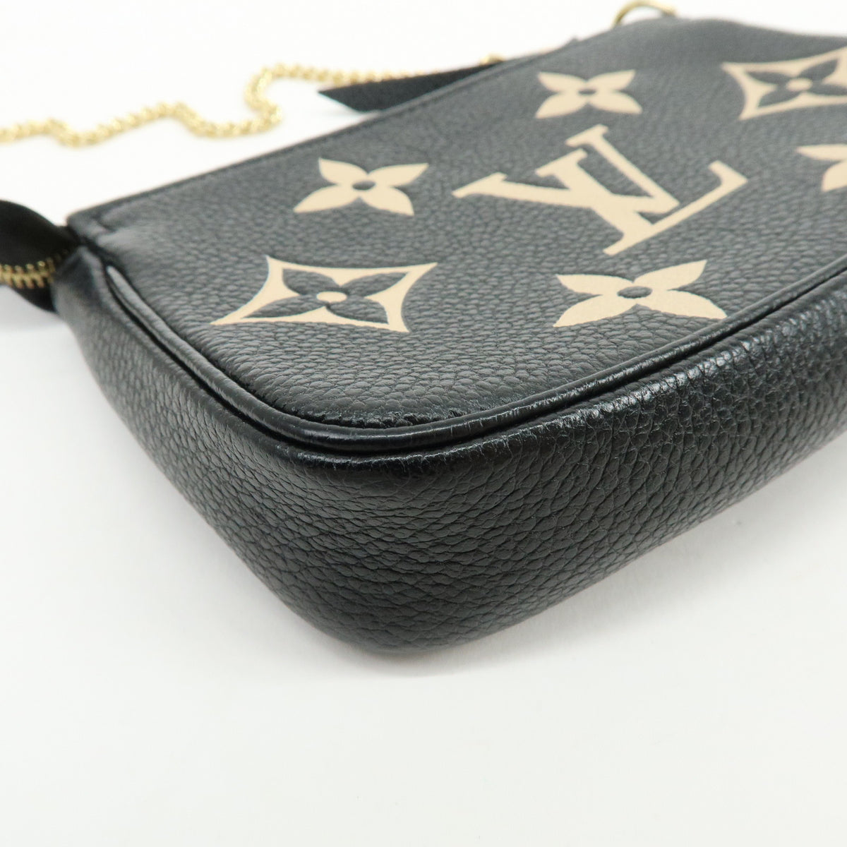 Louis Vuitton Monogram Bicolor Empreinte Mini Pochette Accessory M80732