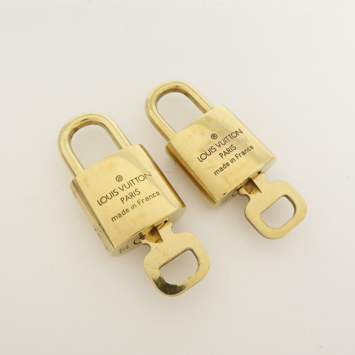 Louis Vuitton Lot of 10 Metal Lock & Key Cadena Key Lock Gold