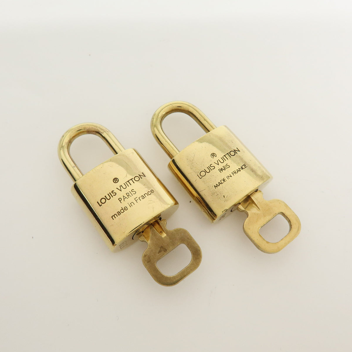 Louis Vuitton Lot of 10 Metal Lock & Key Cadena Key Lock Gold