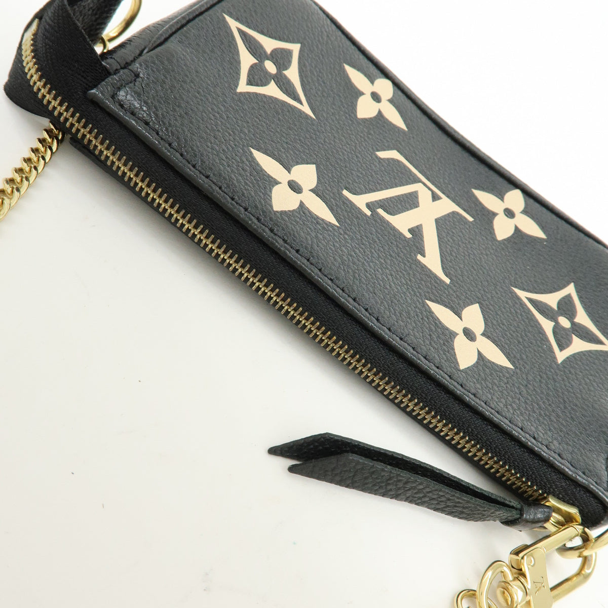 Louis Vuitton Monogram Bicolor Empreinte Mini Pochette Accessory M80732