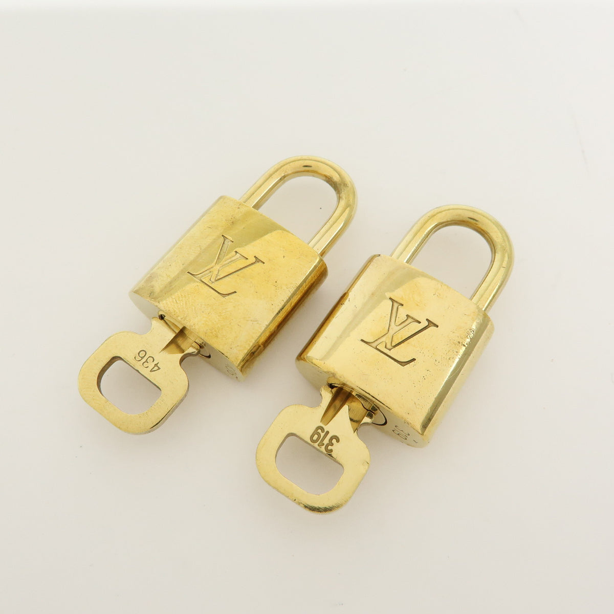 Louis Vuitton Lot of 10 Metal Lock & Key Cadena Key Lock Gold