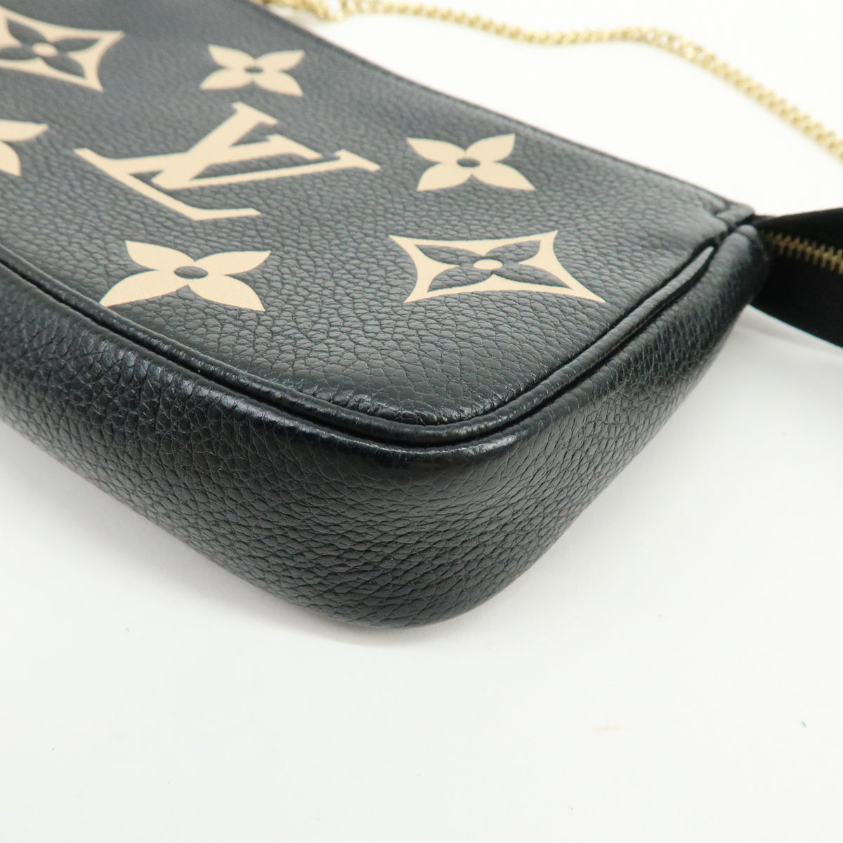 Louis Vuitton Monogram Bicolor Empreinte Mini Pochette Accessory M80732