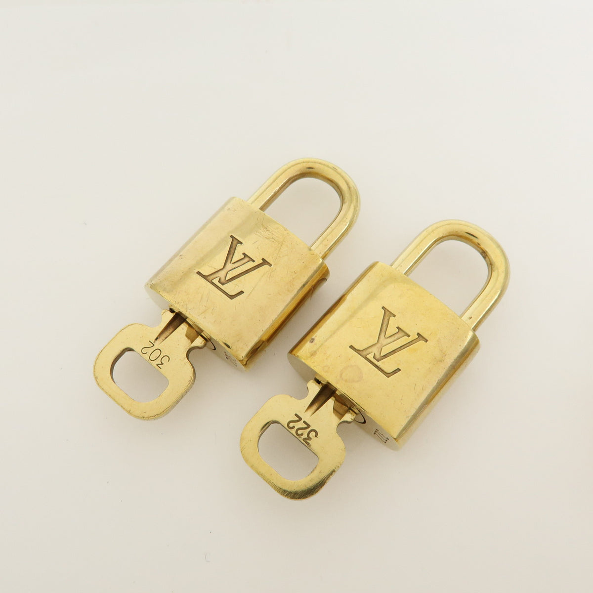 Louis Vuitton Lot of 10 Metal Lock & Key Cadena Key Lock Gold