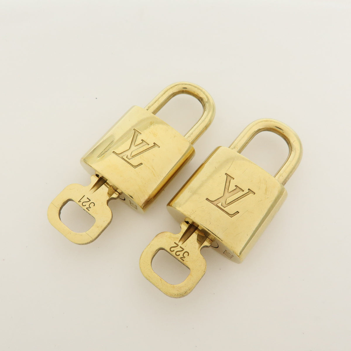 Louis Vuitton Lot of 10 Metal Lock & Key Cadena Key Lock Gold