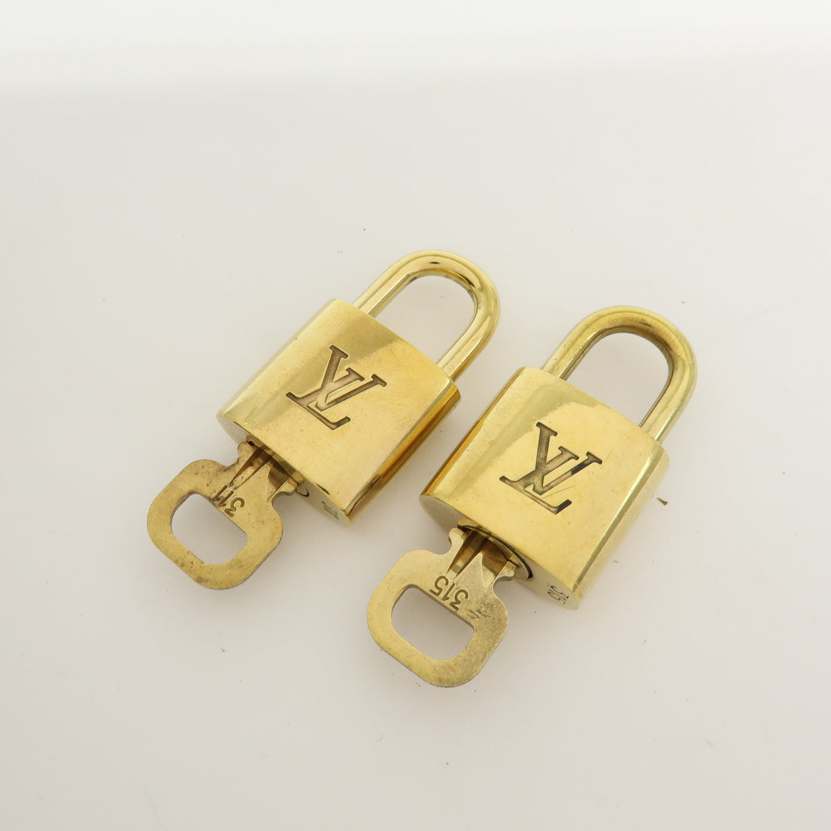 Louis Vuitton Lot of 10 Metal Lock & Key Cadena Key Lock Gold