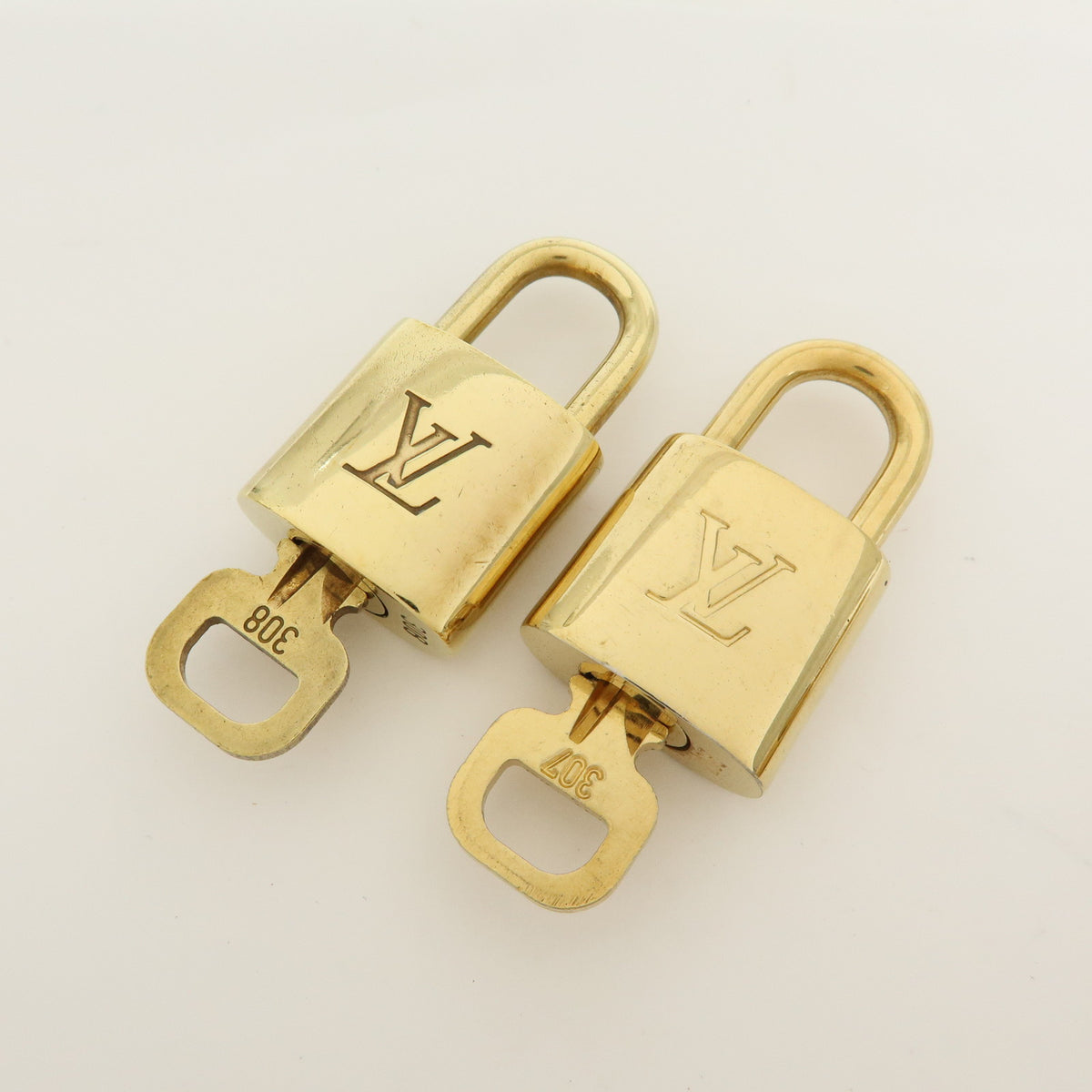 Louis Vuitton Lot of 10 Metal Lock & Key Cadena Key Lock Gold