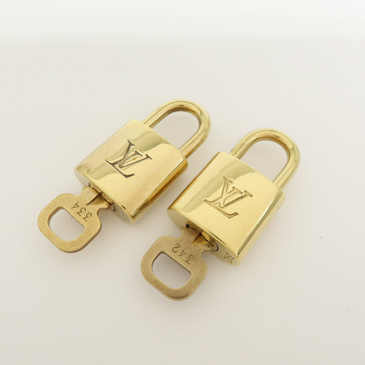 Louis Vuitton Lot of 10 Metal Lock & Key Cadena Key Lock Gold