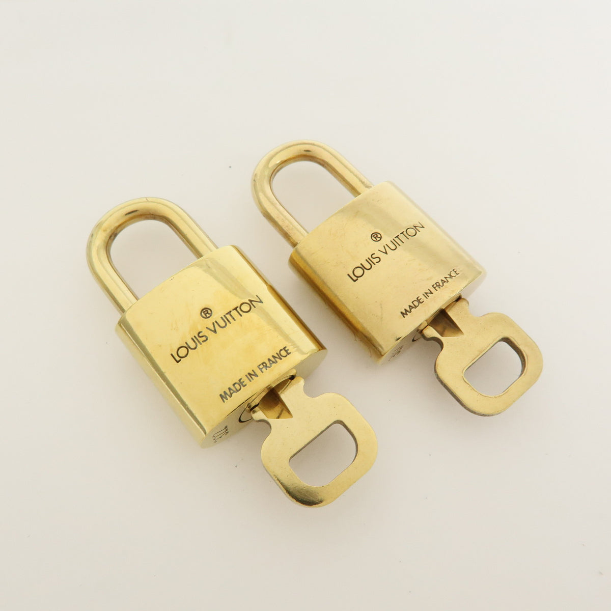 Louis Vuitton Lot of 10 Metal Lock & Key Cadena Key Lock Gold