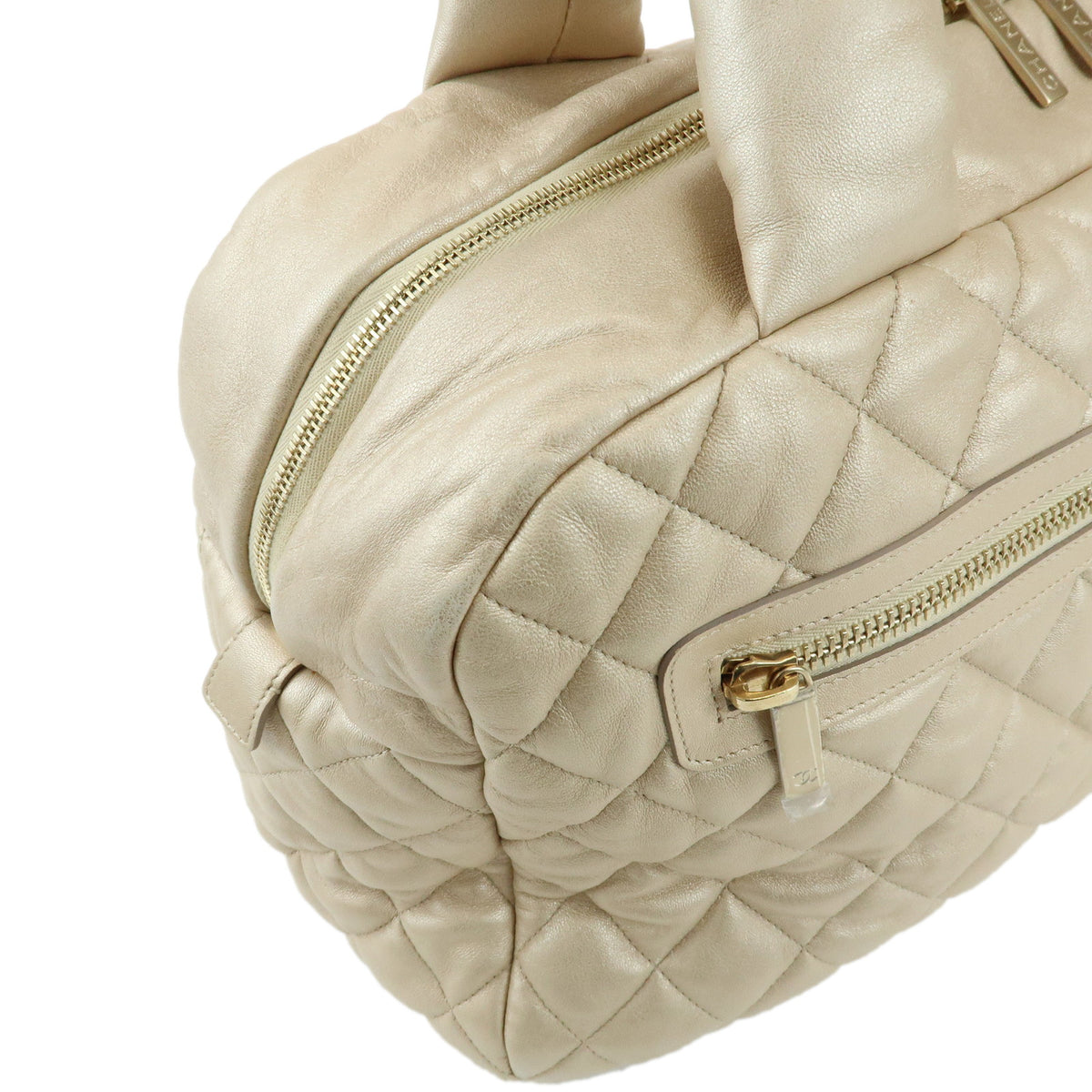 CHANEL COCO COCOON Lamb Skin Boston Bag Champagne Gold A47205