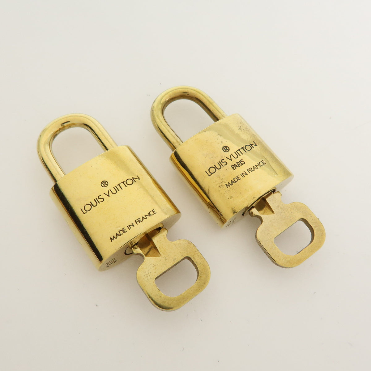 Louis Vuitton Lot of 10 Metal Lock & Key Cadena Key Lock Gold
