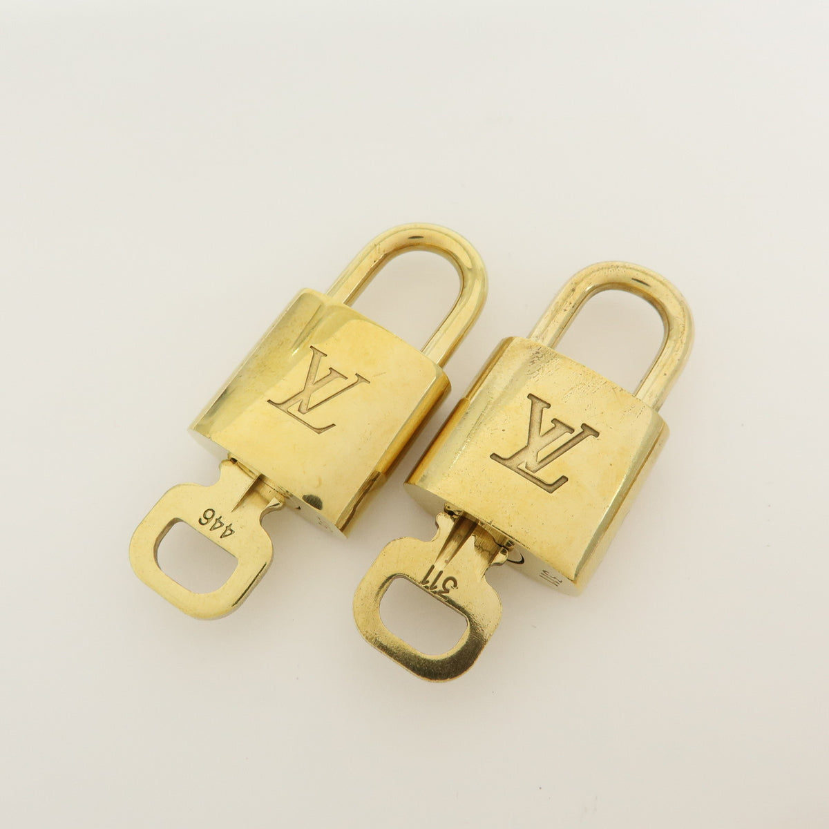 Louis Vuitton Lot of 10 Metal Lock & Key Cadena Key Lock Gold