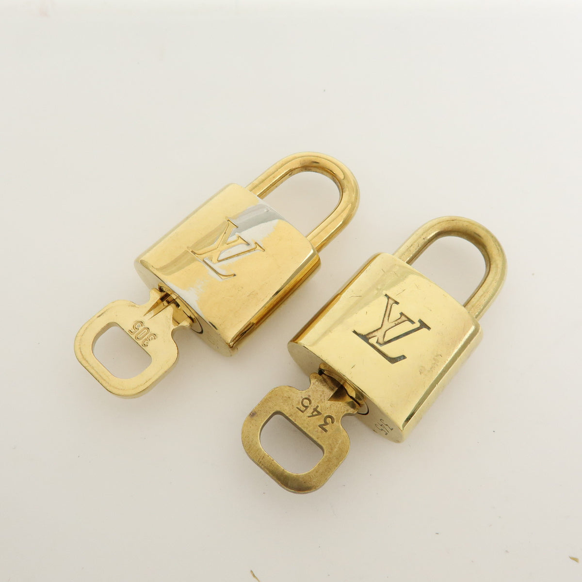 Louis Vuitton Lot of 10 Metal Lock & Key Cadena Key Lock Gold