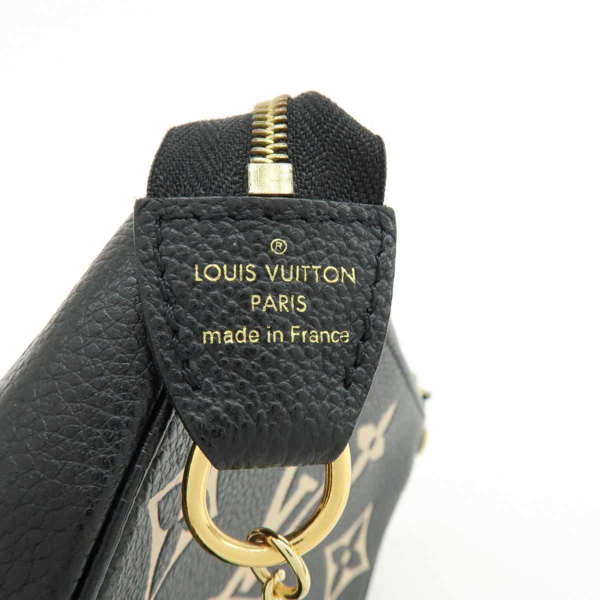 Louis Vuitton Monogram Bicolor Empreinte Mini Pochette Accessory M80732