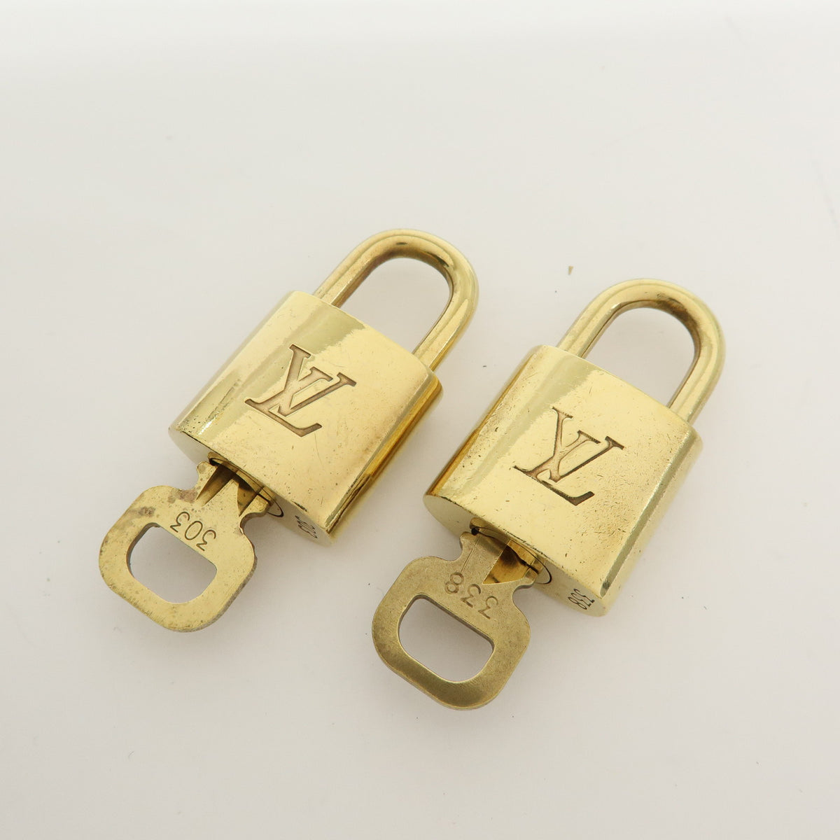 Louis Vuitton Lot of 10 Metal Lock & Key Cadena Key Lock Gold
