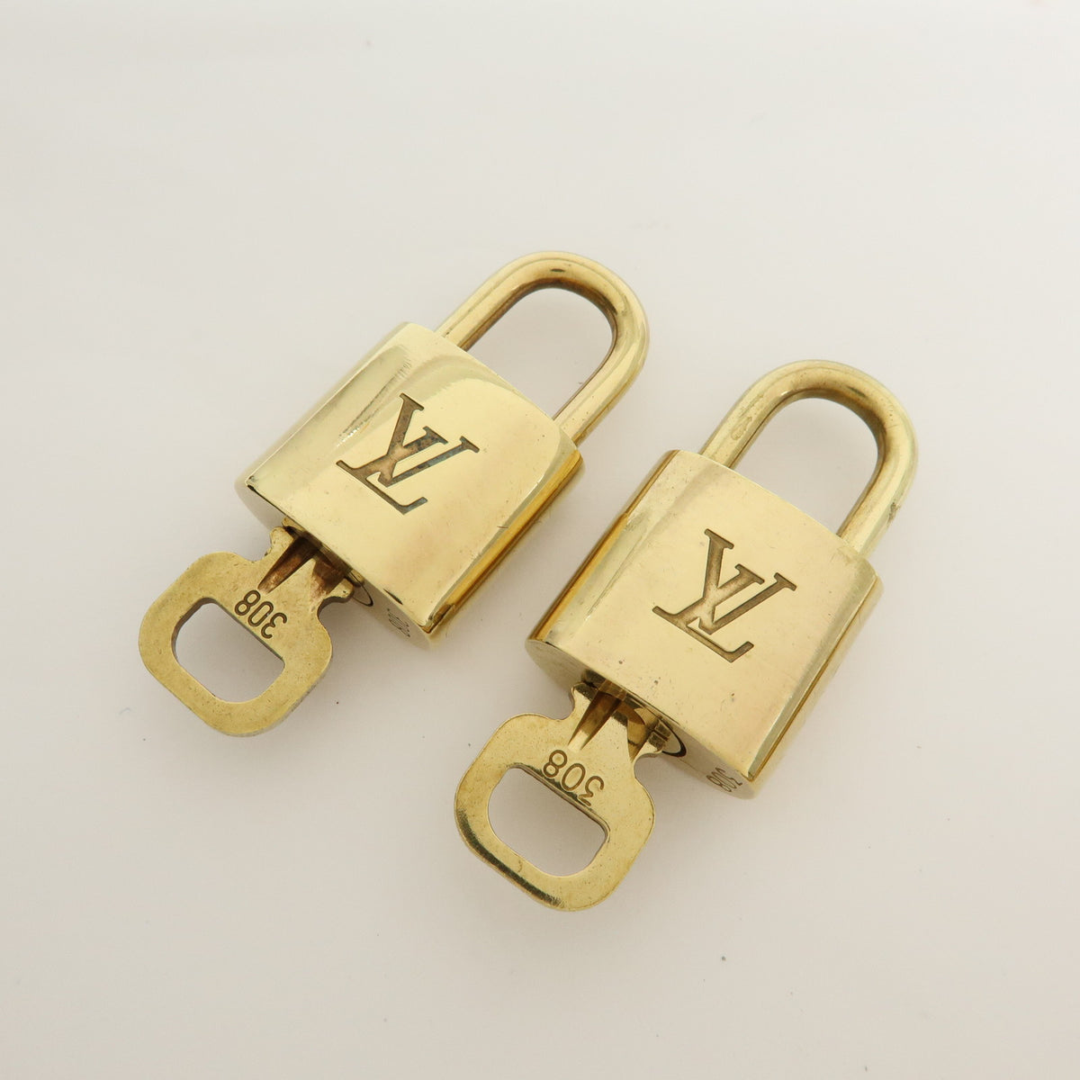 Louis Vuitton Lot of 10 Metal Lock & Key Cadena Key Lock Gold