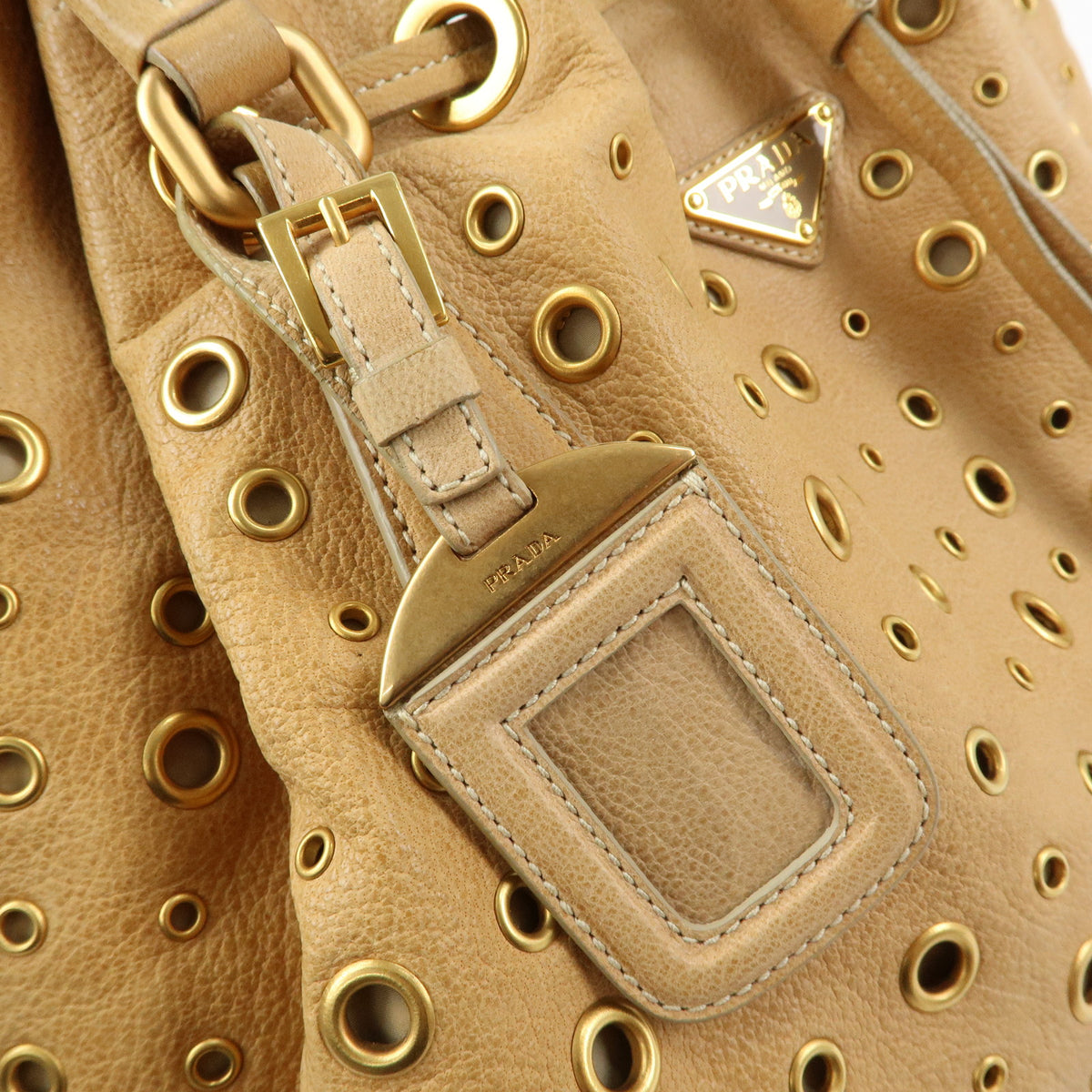 PRADA Triangle Logo Perforated Leather Tote Bag Tassel Beige BR3552