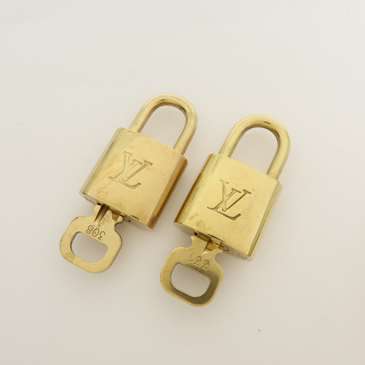 Louis Vuitton Lot of 10 Metal Lock & Key Cadena Key Lock Gold