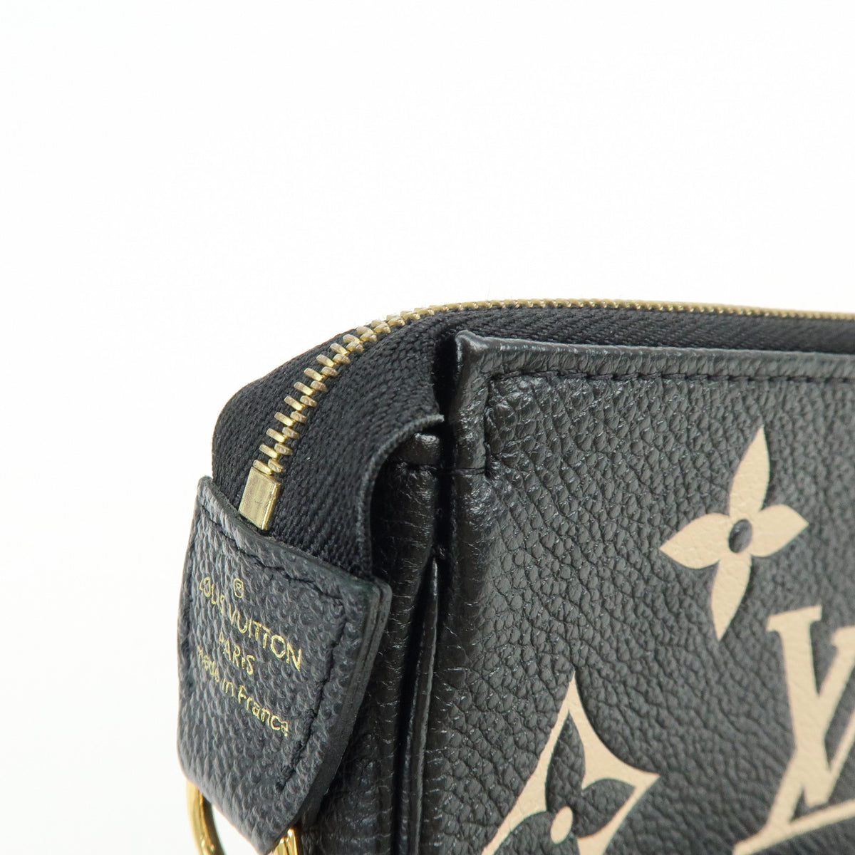 Louis Vuitton Monogram Bicolor Empreinte Mini Pochette Accessory M80732
