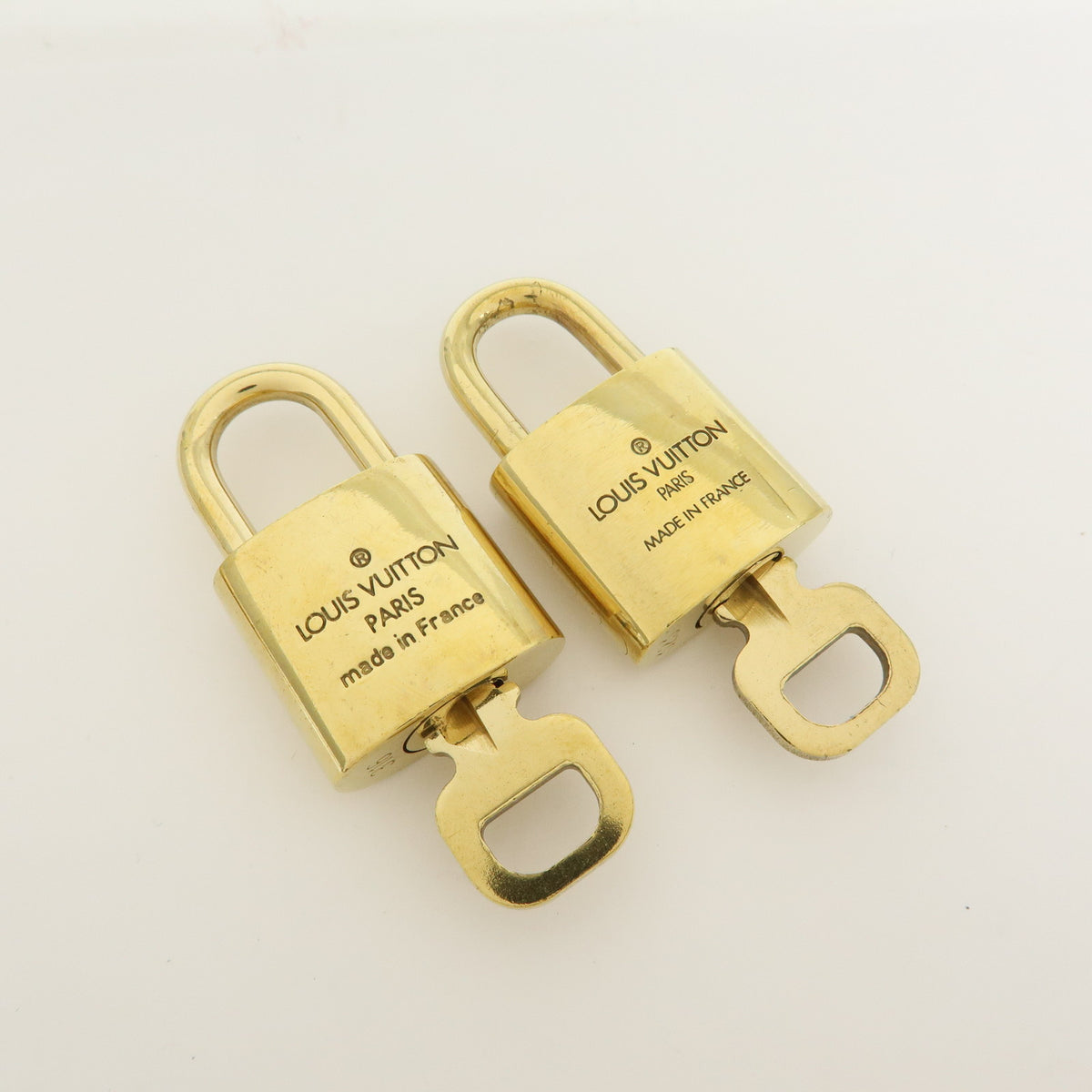 Louis Vuitton Lot of 10 Metal Lock & Key Cadena Key Lock Gold
