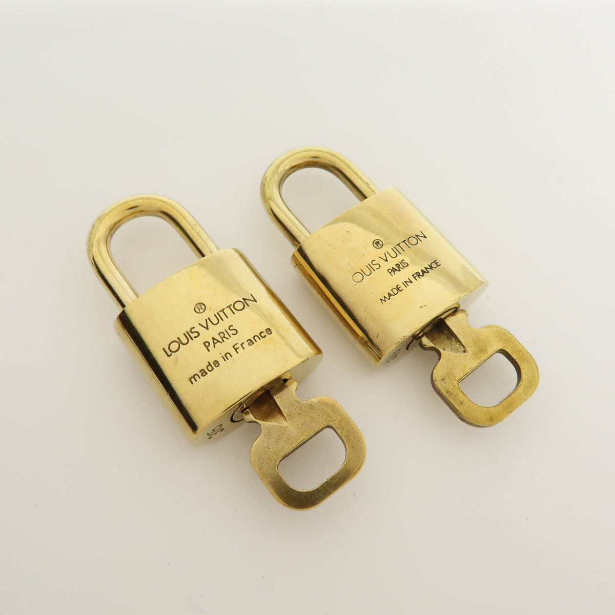 Louis Vuitton Lot of 10 Metal Lock & Key Cadena Key Lock Gold