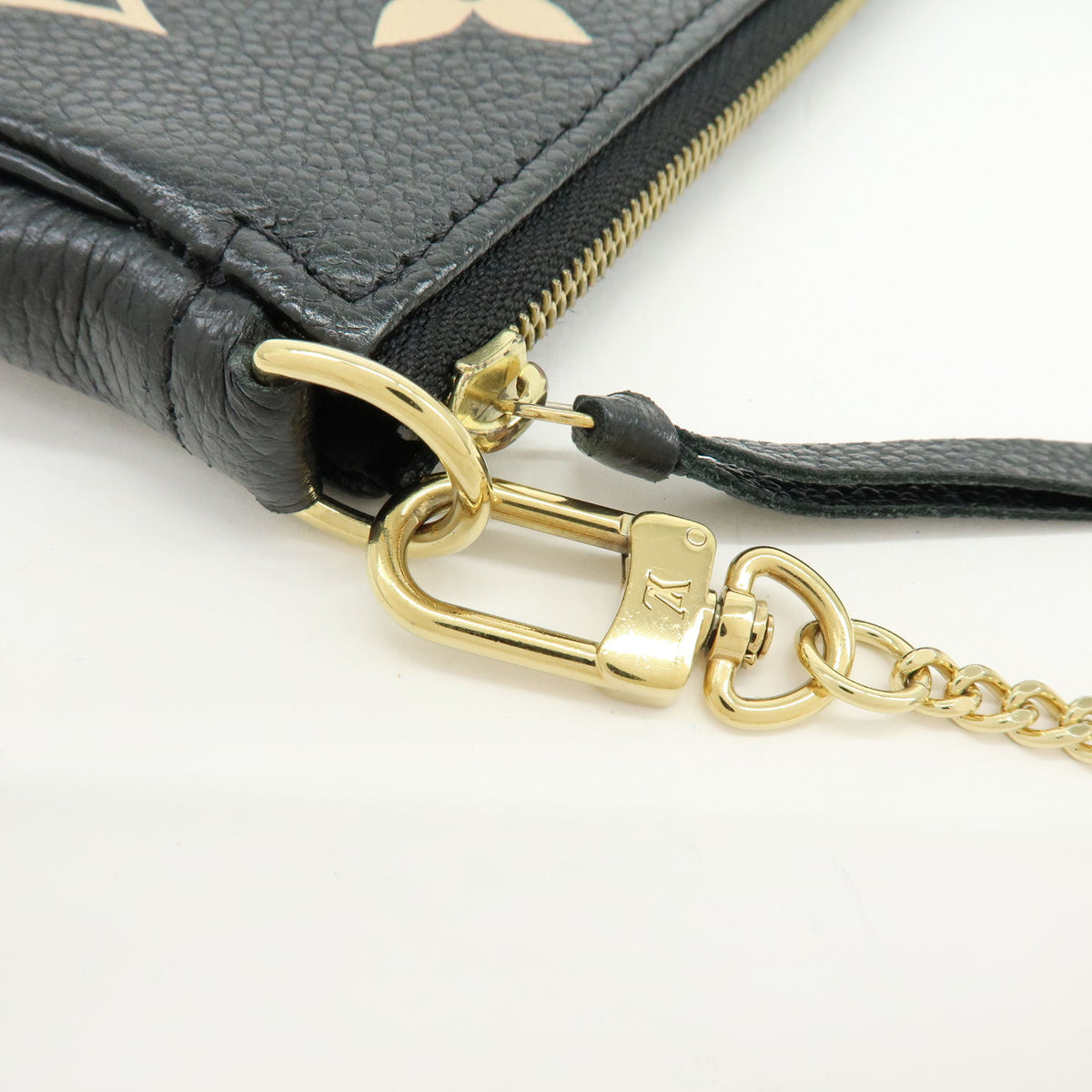 Louis Vuitton Monogram Bicolor Empreinte Mini Pochette Accessory M80732