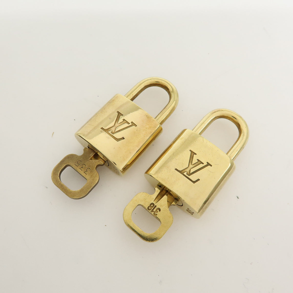 Louis Vuitton Lot of 10 Metal Lock & Key Cadena Key Lock Gold